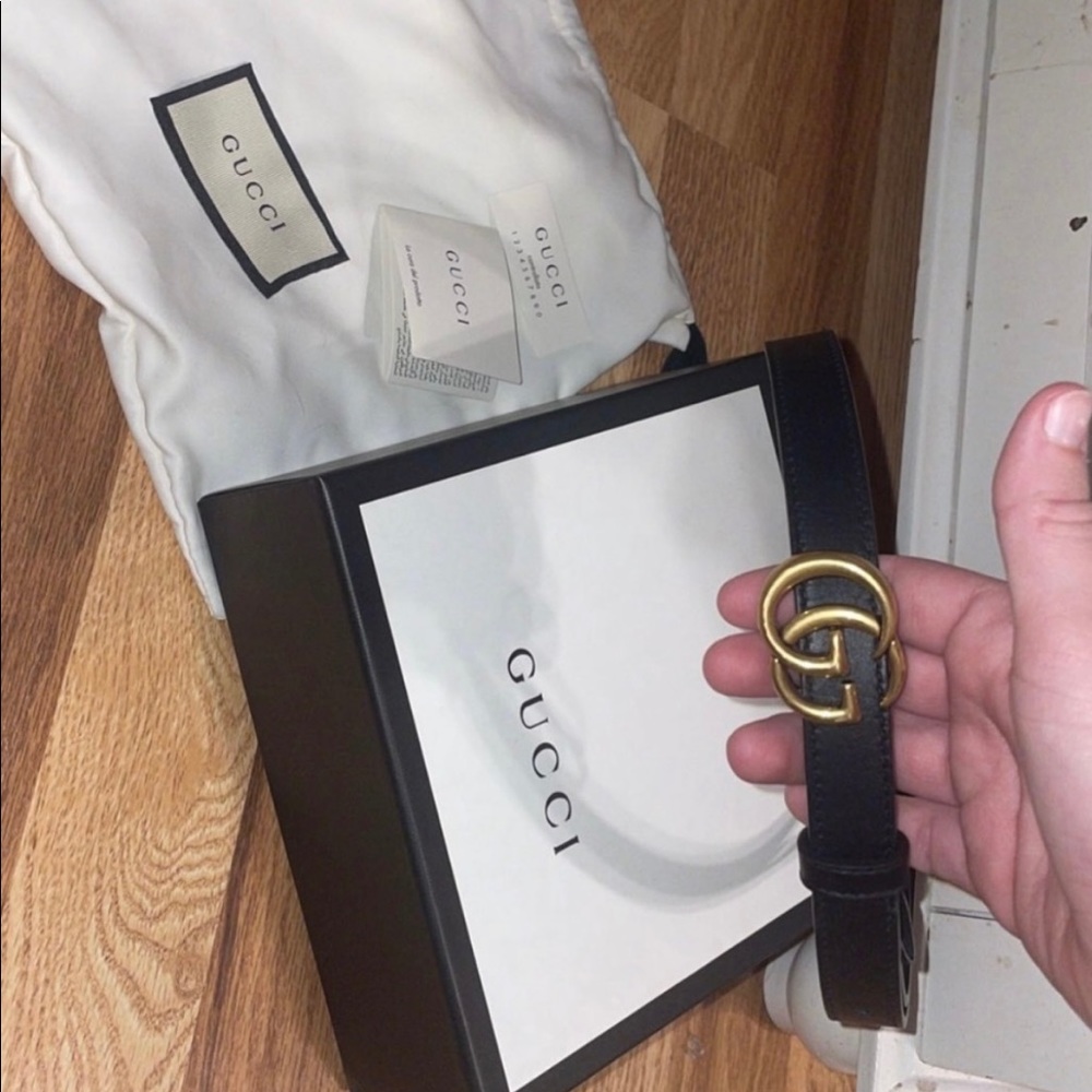 Womans authentic gucci belt black size 75.  .8 inch thick. New …used twice.
